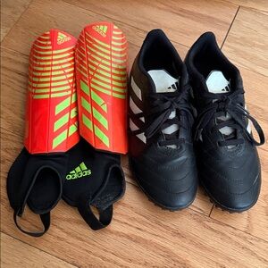 Adidas Kids Black and White Sneakers with Orange Shin Guards